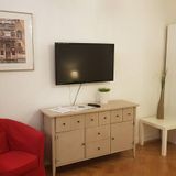 TV, arm-chair and clothes storage, 1-bdr corporate apartm.