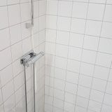 Fully tiled shower in 1-bedroom corporate apartment.