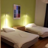 Bedroom with two beds, 1,5-bdr serviced apartment.